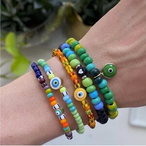 April Soderstrom Piñata Beaded Stretch Bracelet Green & Turquoise Evil Eye Charm